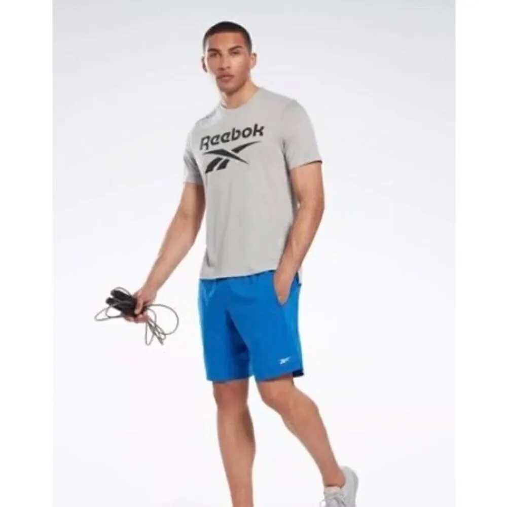 REEBOK - NWT - M Sz Medium Speedwick Active Shorts in Victor Blue. POCKETS!